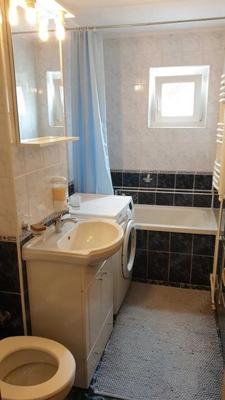 Apartament cu 2 camere semidecomandat în Moșnița Nouă