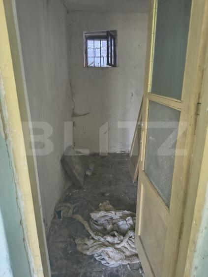 Casă cu 2 camere cu Teren 1200 Mp în Nord