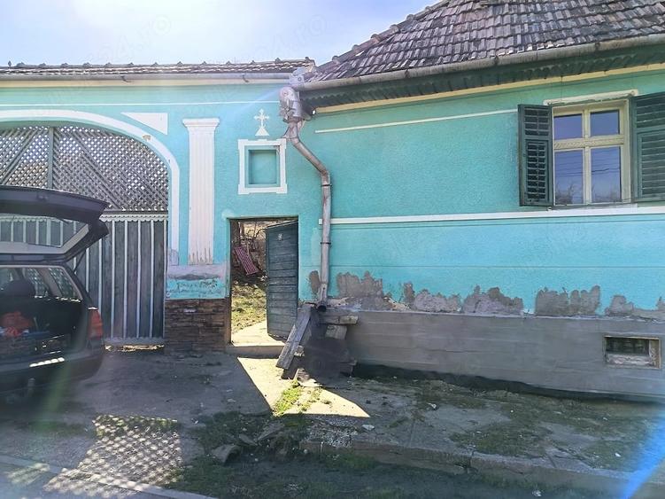 Casă cu Teren 1565 Mp în Sângătin