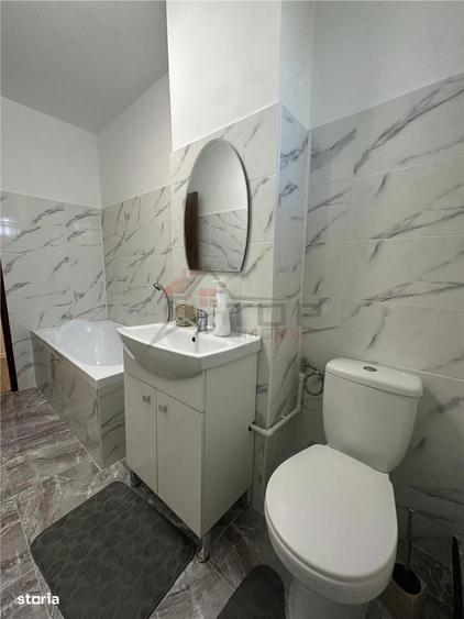Apartament cu 2 camere semidecomandat în Podu Roș