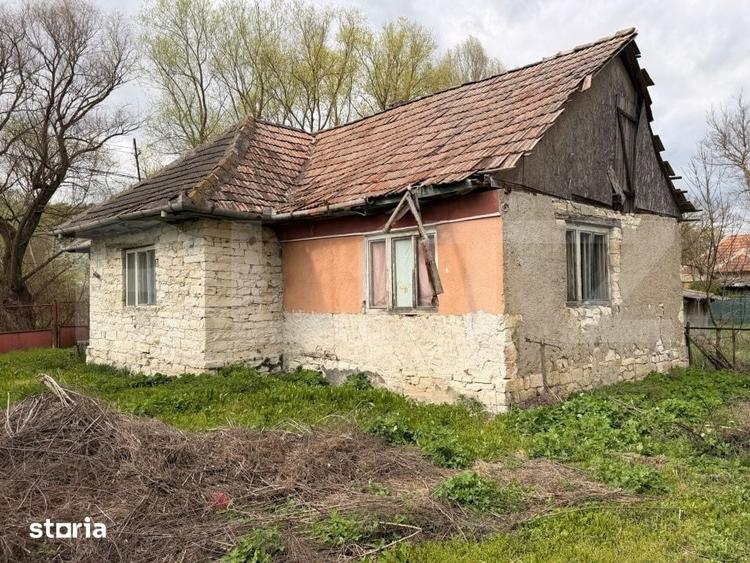 Casă cu 2 camere cu Teren 2600 Mp în Vultureni