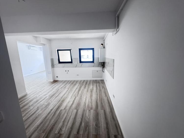 apartament cu 2 camere-de inchiriat-bloc nou-parcare proprie - 1
