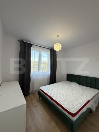 Apartament cu 3 camere semidecomandat, mobilat în Chinteni
