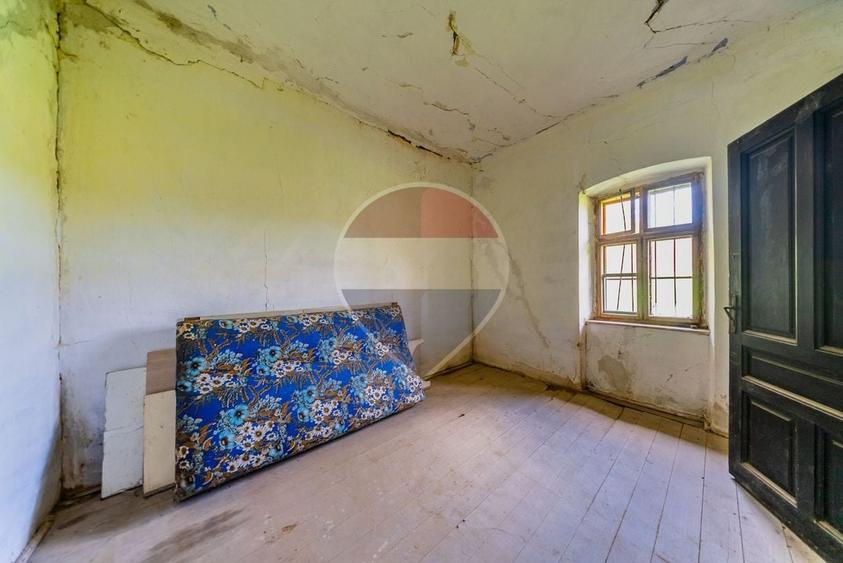 Casă individuală cu 4 camere cu Teren 5000 Mp în Cărand