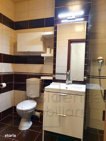 Apartament cu 2 camere semidecomandat, mobilat în Central