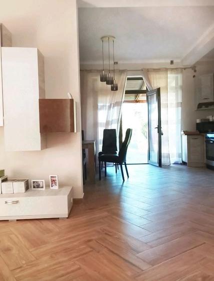 Casă cu Teren 1000 Mp în Central