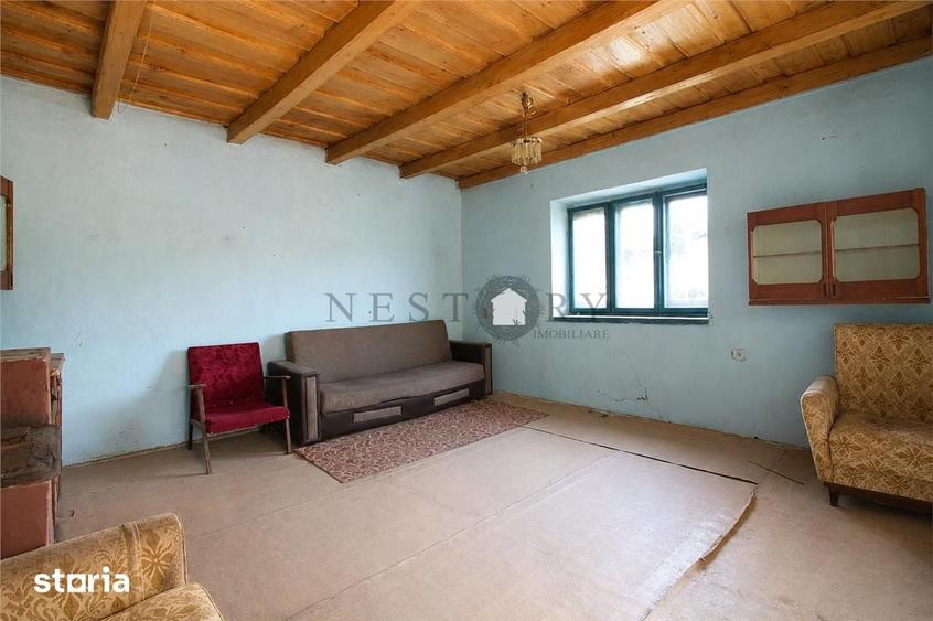 Casă cu 3 camere cu Teren 1500 Mp în Vultureni