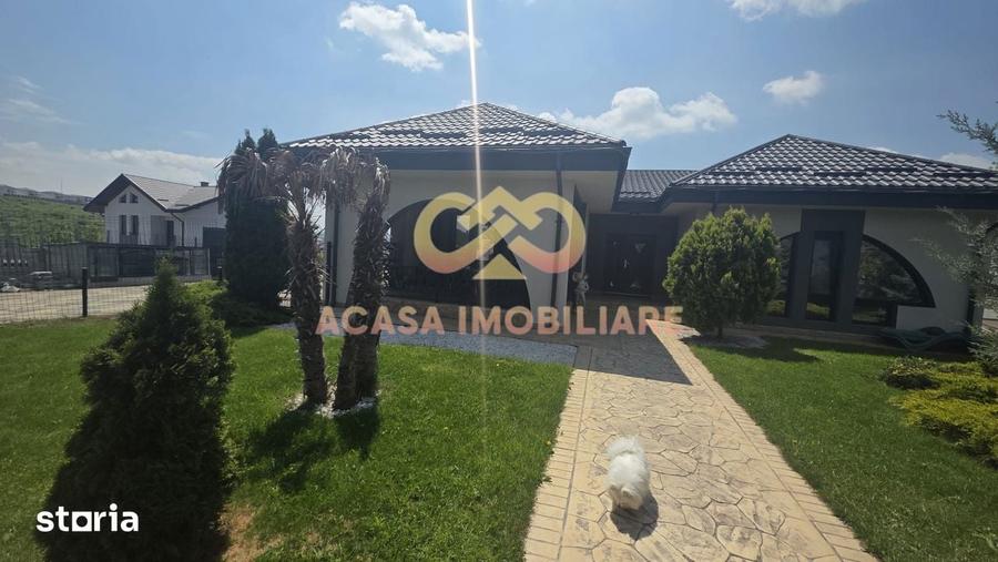 Casă cu 5 camere cu Teren 1700 Mp în Bucium