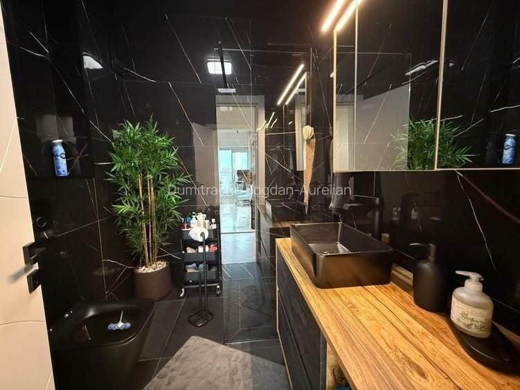 Apartament cu 4 camere decomandat în Cățelu