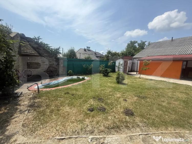 Casă cu 4 camere cu Teren 1692 Mp în Lunca (Voinești)