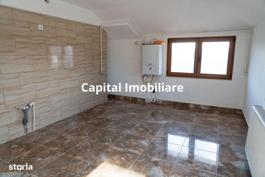 Apartament nemobilat 3 camere cu teren