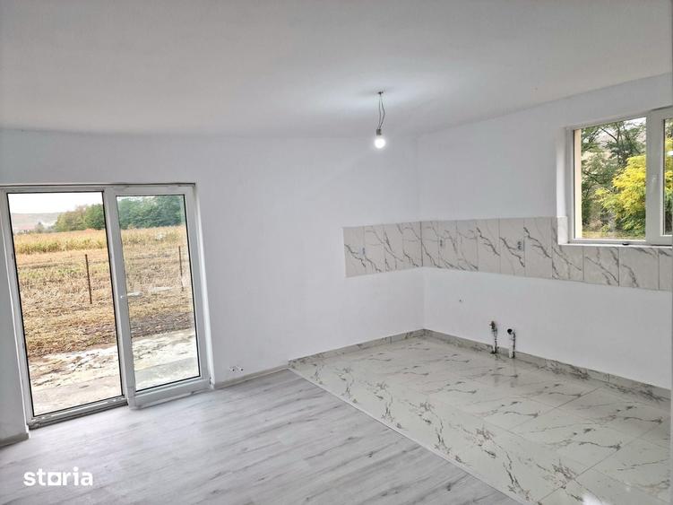 Casă cu 4 camere cu Teren 1000 Mp în Căianu
