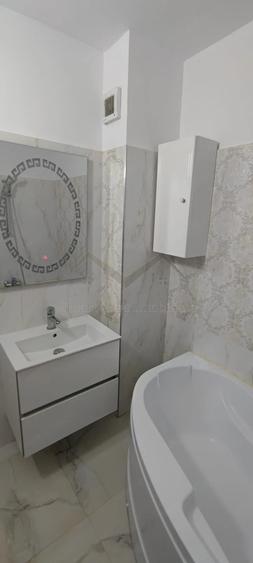 Apartament cu 3 camere decomandat în Filiași
