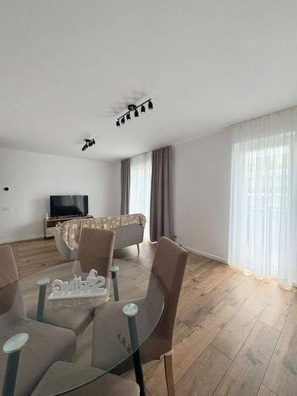 Apartament nou cu 2 camere 55mp, etaj intermediar, finisat modernh, mobilat si utilat, cu garaj sub - 3