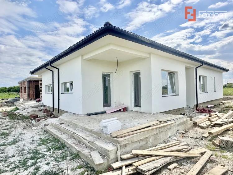 Duplex cu 3 camere si 2 bai - 76 mp utili - Bucovat - 1