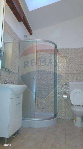 Casă cu 4 camere cu Teren 396 Mp în Central