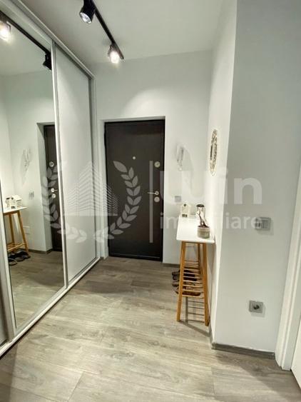 Apartament cu 2 camere semidecomandat, mobilat în Borhanci