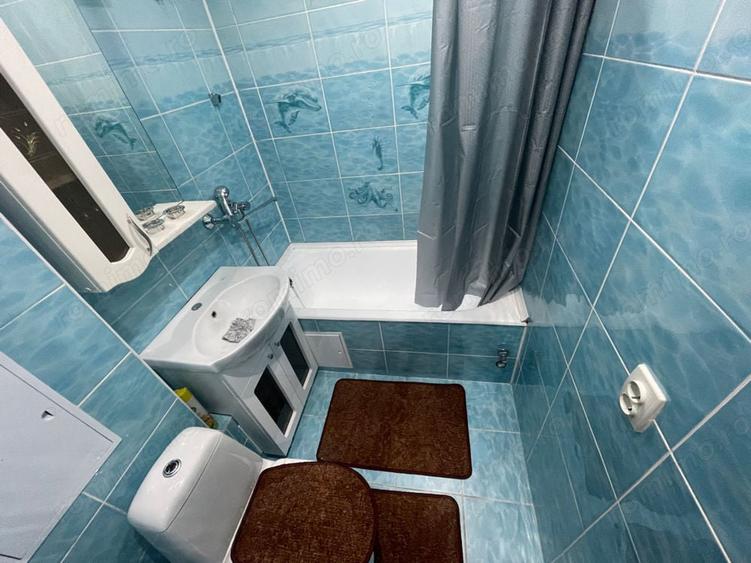 Apartament cu 3 camere în Bogdăneștilor
