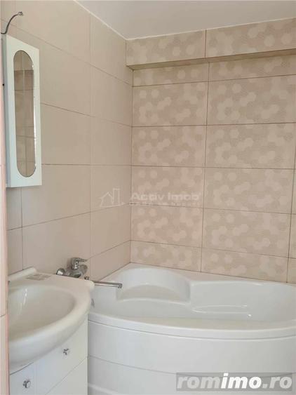 Casă cu 12 camere cu Teren 1000 Mp în Români
