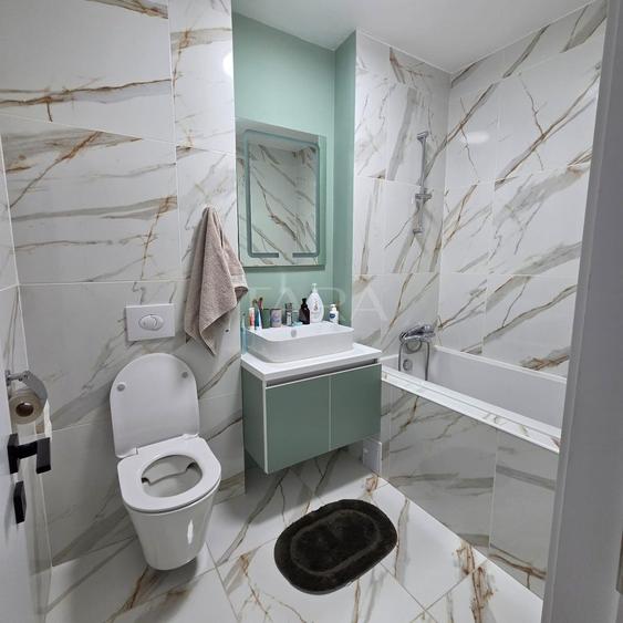 Apartament cu 3 camere semidecomandat, mobilat în Baciu