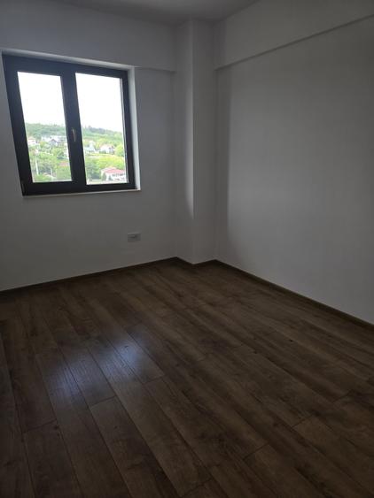 Apartament cu 2 camere semidecomandat în Bucium