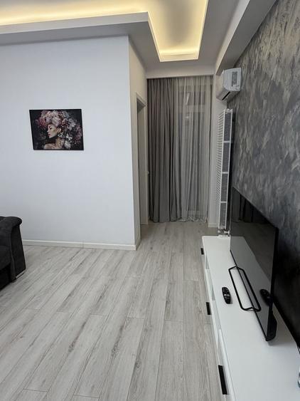 Casă cu 2 camere decomandat în Central