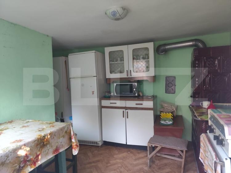 Casă individuală cu 5 camere cu Canalizare în Cigmău