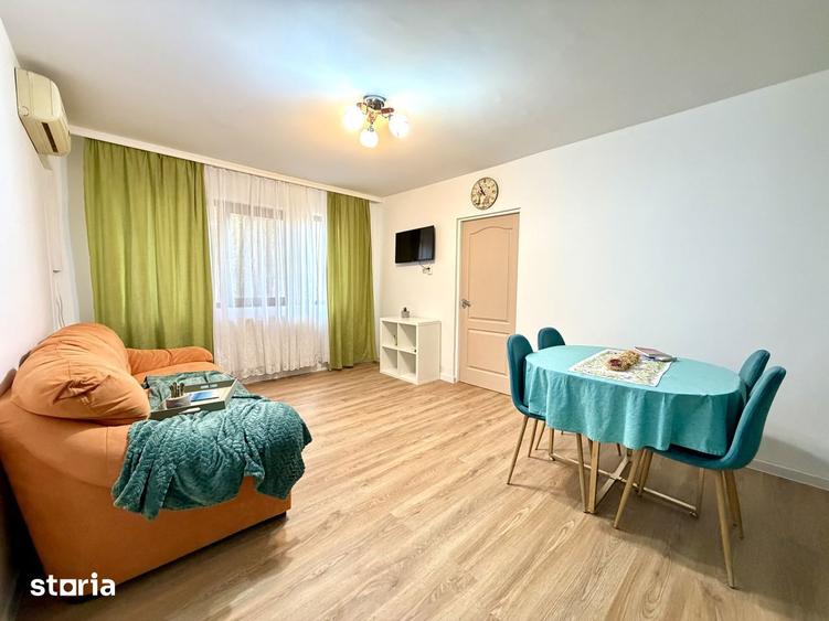 Apartament cu 2 camere semidecomandat, mobilat în Take Ionescu