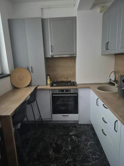 Apartament cu 2 camere semidecomandat, mobilat în UTA