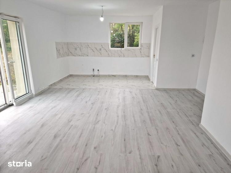 Casă cu 4 camere cu Teren 1000 Mp în Căianu