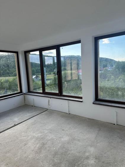 Casă cu 4 camere în Cotmeana