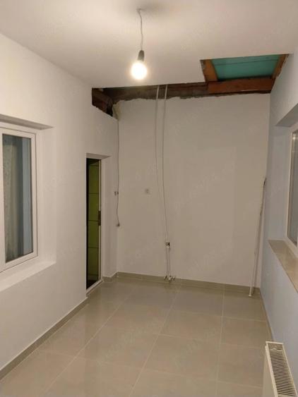 Casă cu Teren 200 Mp în Central