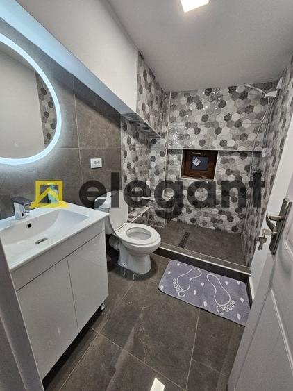 Casă individuală cu 7 camere cu Canalizare în Titulescu