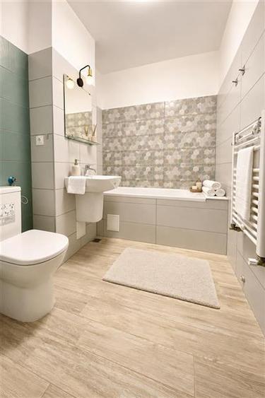 Apartament cu 3 camere decomandat în Tractorul