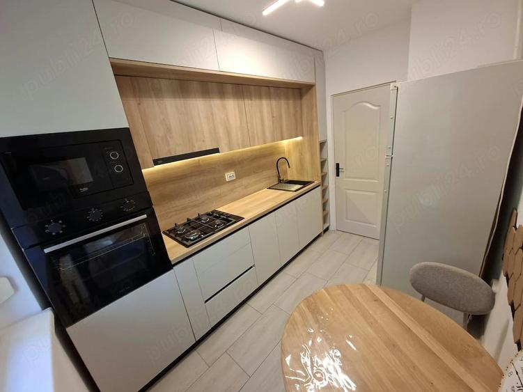 Apartament cu 2 camere semidecomandat, mobilat în Central
