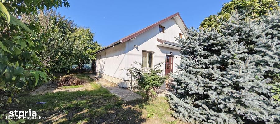 Casă cu 3 camere decomandat cu Teren 500 Mp în Holboca