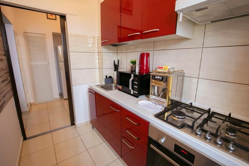 Apartament cu 2 camere semidecomandat, mobilat în Universitate
