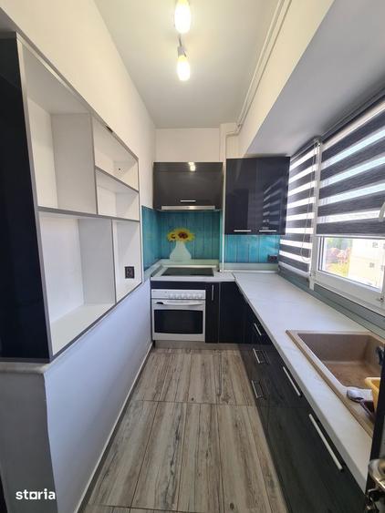Apartament cu 3 camere decomandat în Rovine