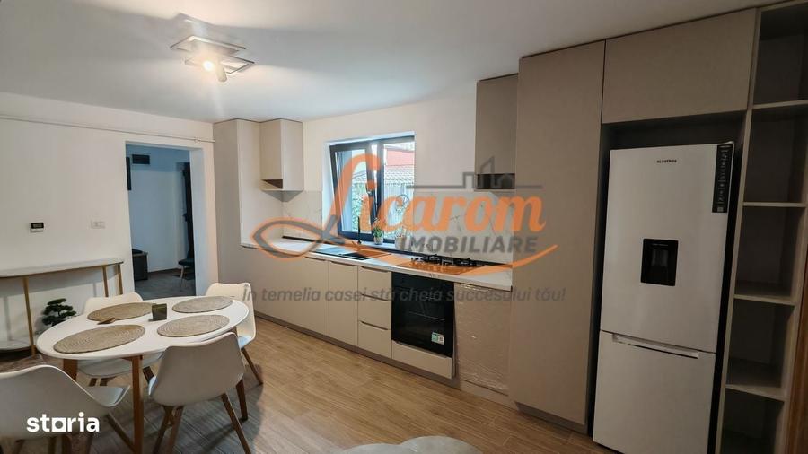 Apartament cu 4 camere în Răcădău