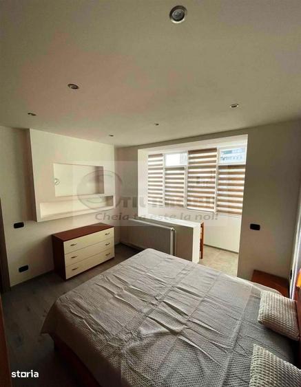 Apartament cu 2 camere semidecomandat, mobilat în Podu Roș
