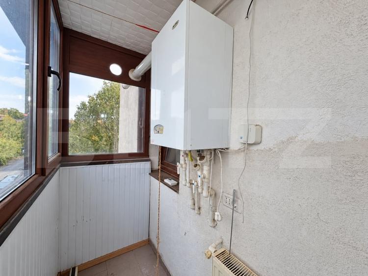 Apartament cu 3 camere semidecomandat în Bucium