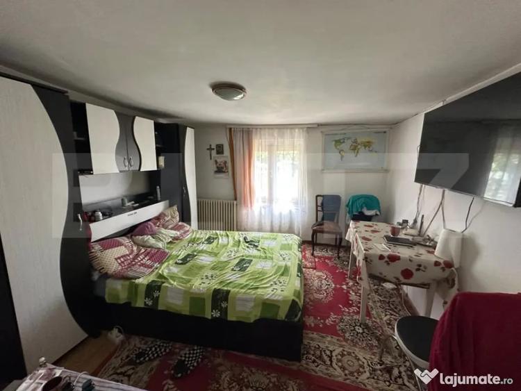 Casă cu 3 camere cu Teren 1500 Mp în Bucium