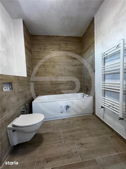 Apartament cu 3 camere semidecomandat în Borhanci