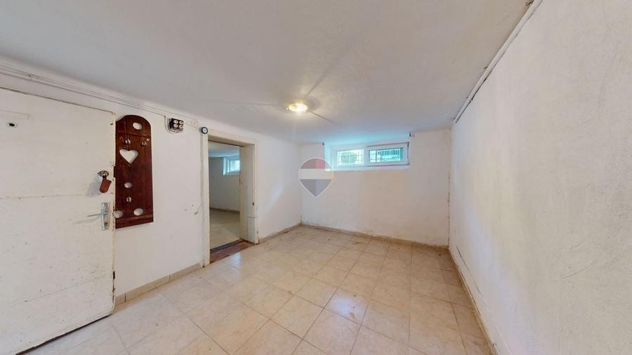 Casă individuală cu 7 camere cu Teren 319 Mp în Centrul Civic