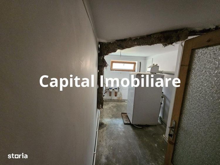 Casă cu 4 camere în Roman