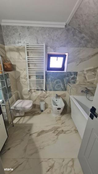 Casă cu 4 camere în Curtea de Argeș