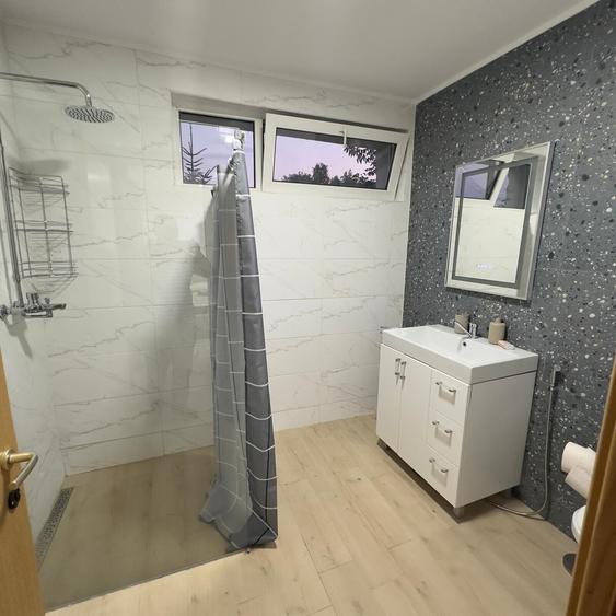 Casă cu Teren 270 Mp în Tunari