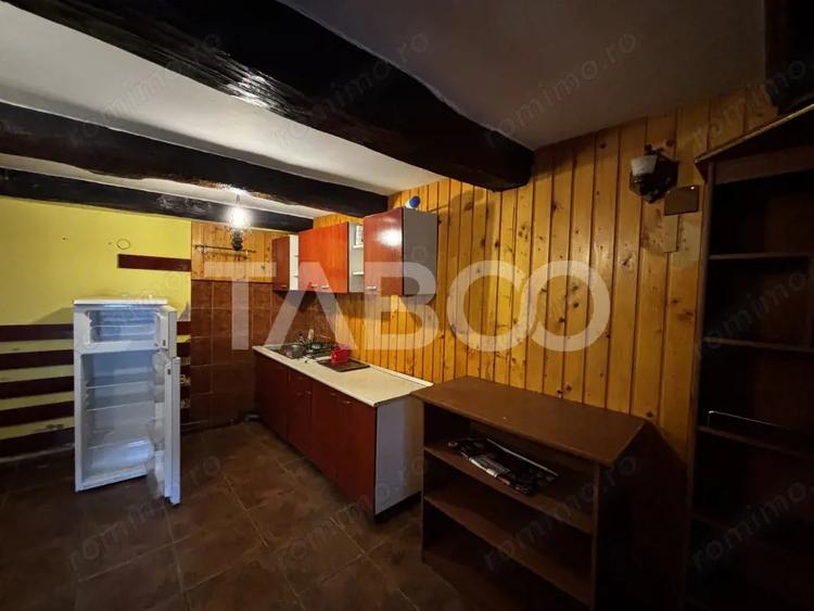 Casă cu 5 camere cu Teren 250 Mp în Cisnădioara