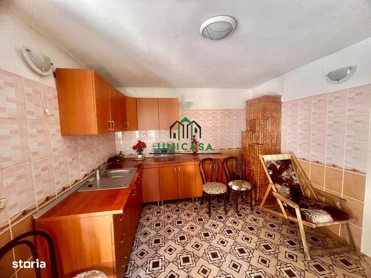 Casă cu 4 camere în Poenari