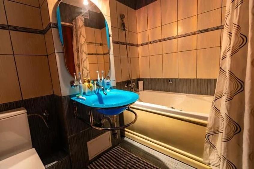 Apartament cu 4 camere decomandat în Central
